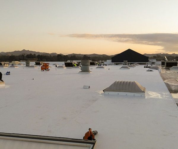 commercial roofers on a flat roof